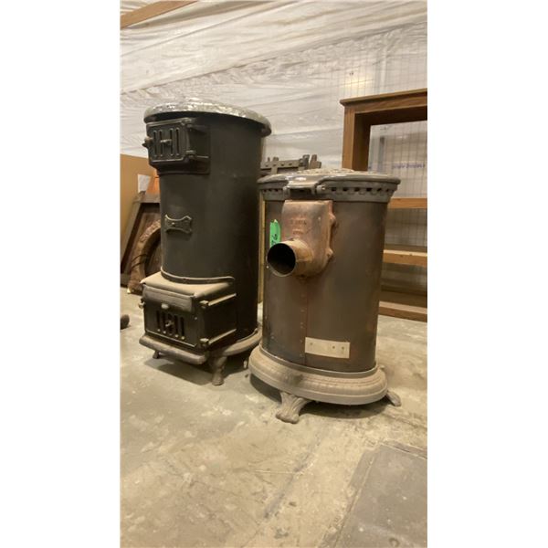 2 VINTAGE CAST IRON WOOD BURNING STOVES