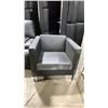 Image 1 : 4 BLACK PADDED ARMCHAIRS
