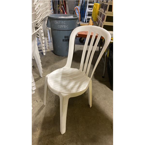 STACK OF 25 WHITE PLASTIC OUTDOOR SLAT BACK EVENT STACKING CHAIRS