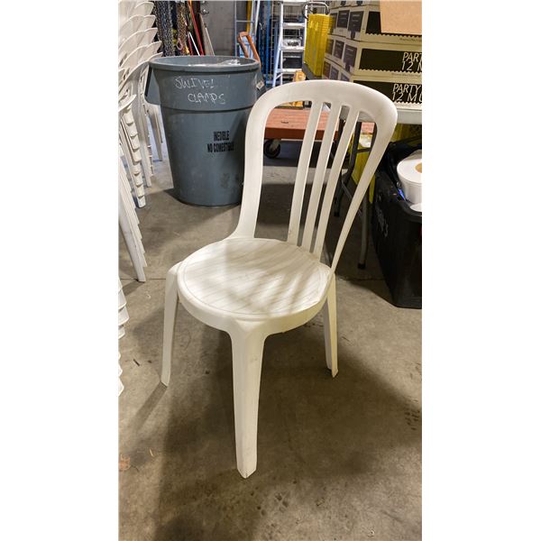 STACK OF 25 WHITE PLASTIC OUTDOOR SLAT BACK EVENT STACKING CHAIRS