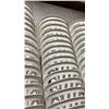 Image 4 : STACK OF 25 WHITE PLASTIC OUTDOOR SLAT BACK EVENT STACKING CHAIRS