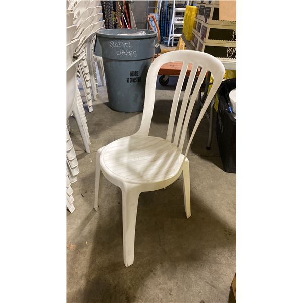 STACK OF 25 WHITE PLASTIC OUTDOOR SLAT BACK EVENT STACKING CHAIRS