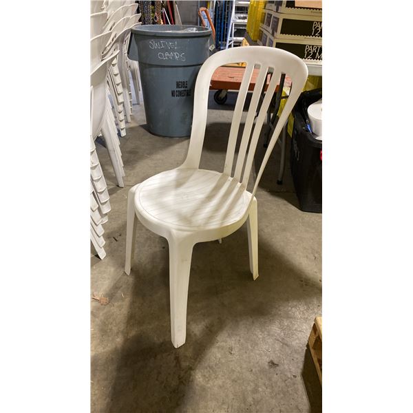 STACK OF 25 WHITE PLASTIC OUTDOOR SLAT BACK EVENT STACKING CHAIRS