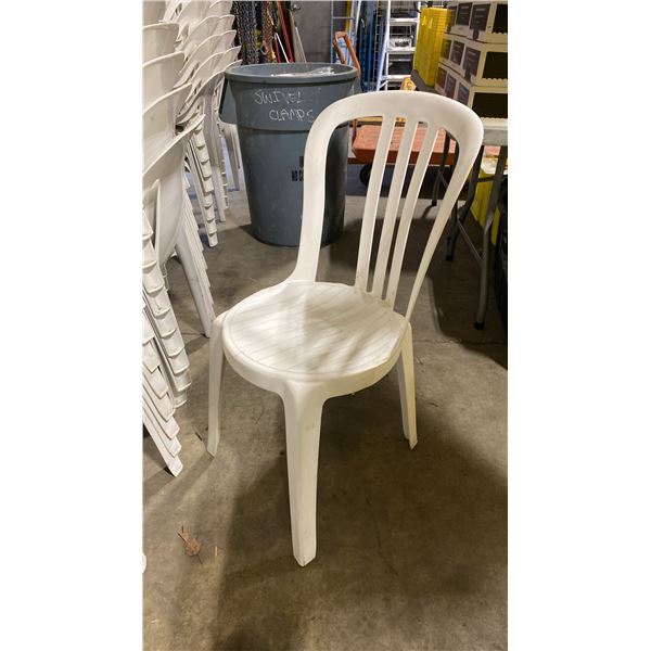 STACK OF 25 WHITE PLASTIC OUTDOOR SLAT BACK EVENT STACKING CHAIRS