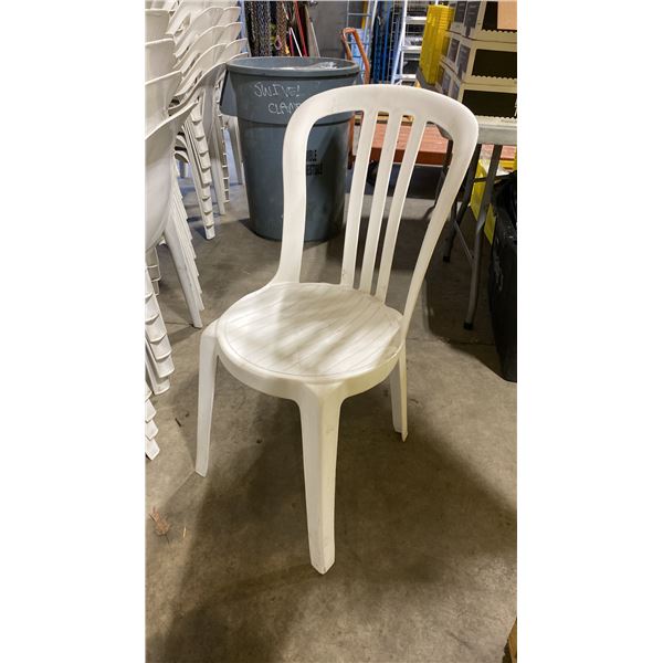 STACK OF 20 WHITE PLASTIC OUTDOOR SLAT BACK EVENT STACKING CHAIRS