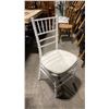 Image 4 : STACK OF 8 WHITE WOOD BAMBOO LOOK COMMERCIAL STACKING EVENT CHAIRS WITH CUSHIONS