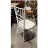 Image 2 : STACK OF 8 WHITE WOOD BAMBOO LOOK COMMERCIAL STACKING EVENT CHAIRS WITH CUSHIONS