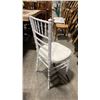 Image 2 : STACK OF 8 WHITE WOOD BAMBOO LOOK COMMERCIAL STACKING EVENT CHAIRS WITH CUSHIONS
