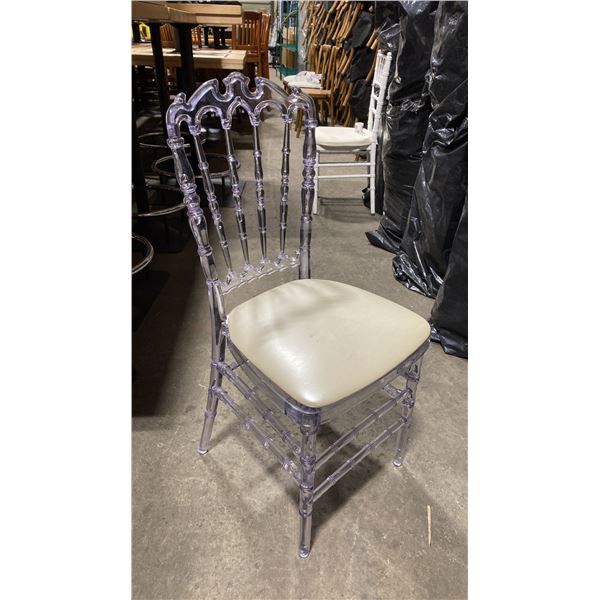 STACK OF 8 CLEAR PLASTIC COMMERCIAL STACKING EVENT CHAIRS WITH CUSHIONS