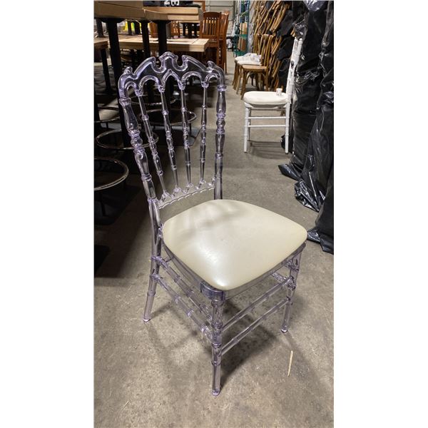 STACK OF 8 CLEAR PLASTIC COMMERCIAL STACKING EVENT CHAIRS WITH CUSHIONS