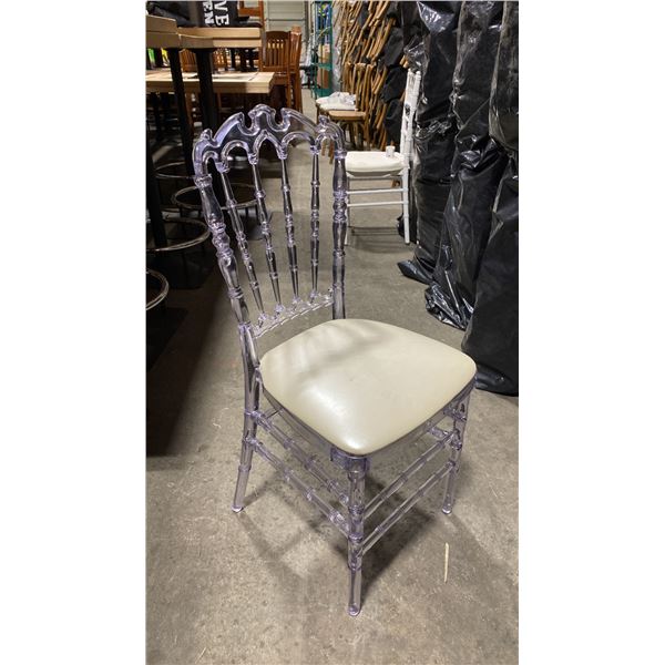 STACK OF 8 CLEAR PLASTIC COMMERCIAL STACKING EVENT CHAIRS WITH CUSHIONS