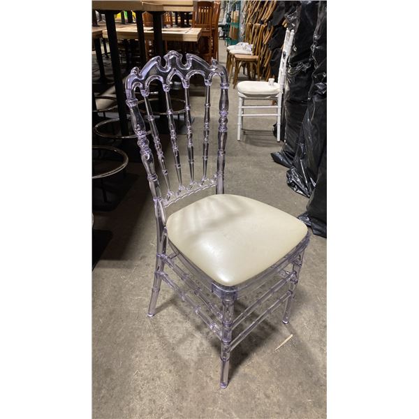 STACK OF 8 CLEAR PLASTIC COMMERCIAL STACKING EVENT CHAIRS WITH CUSHIONS
