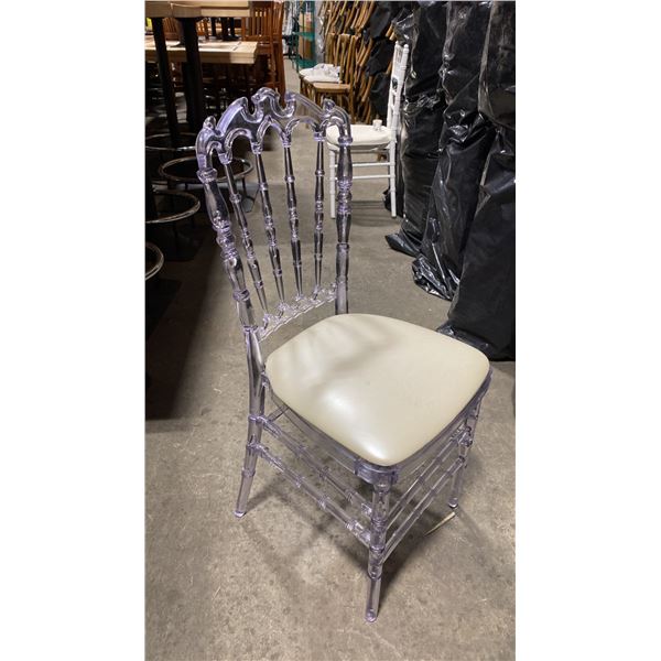 STACK OF 8 CLEAR PLASTIC COMMERCIAL STACKING EVENT CHAIRS WITH CUSHIONS