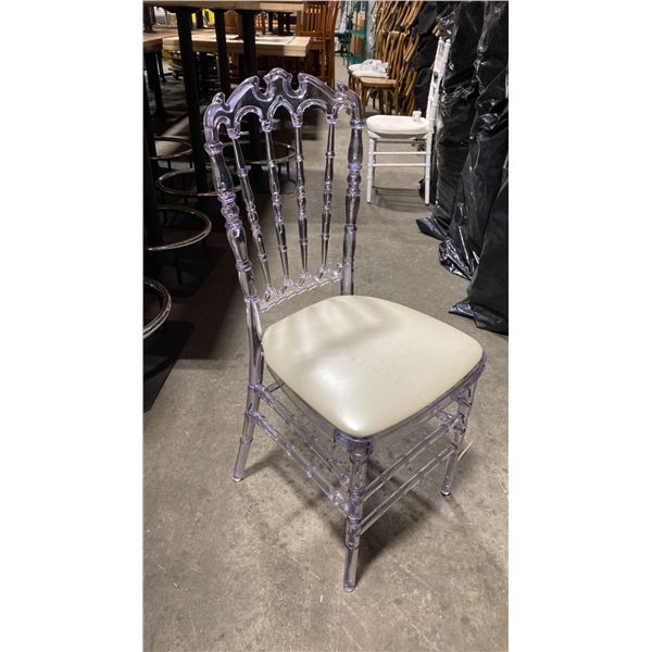 STACK OF 8 CLEAR PLASTIC COMMERCIAL STACKING EVENT CHAIRS WITH CUSHIONS