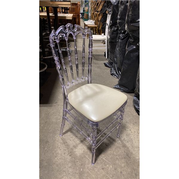 STACK OF 8 CLEAR PLASTIC COMMERCIAL STACKING EVENT CHAIRS WITH CUSHIONS