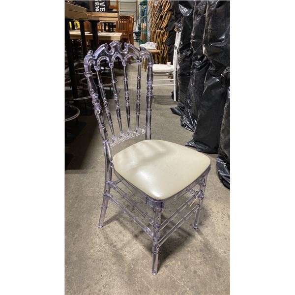 STACK OF 8 CLEAR PLASTIC COMMERCIAL STACKING EVENT CHAIRS WITH CUSHIONS