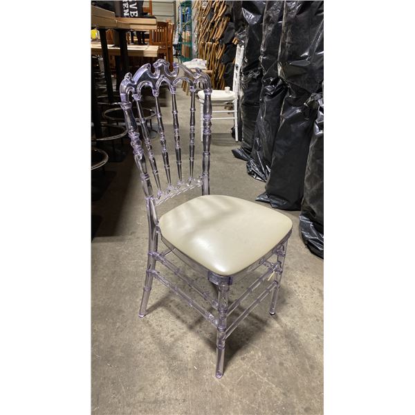 STACK OF 8 CLEAR PLASTIC COMMERCIAL STACKING EVENT CHAIRS WITH CUSHIONS