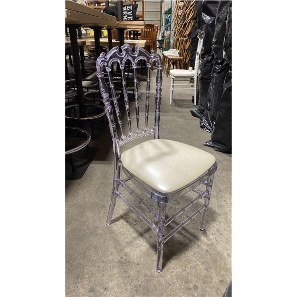 STACK OF 8 CLEAR PLASTIC COMMERCIAL STACKING EVENT CHAIRS WITH CUSHIONS