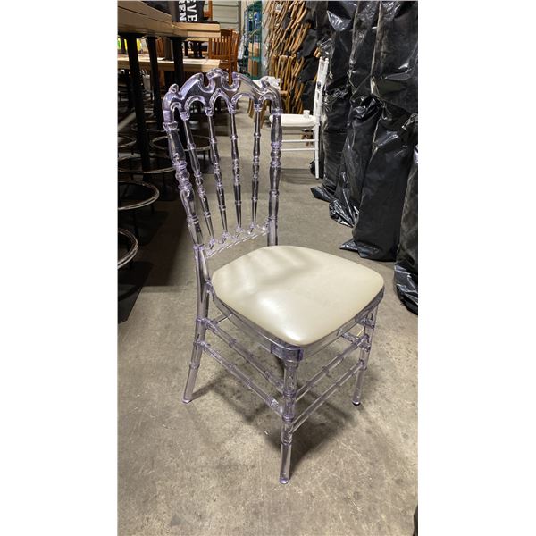 STACK OF 8 CLEAR PLASTIC COMMERCIAL STACKING EVENT CHAIRS WITH CUSHIONS