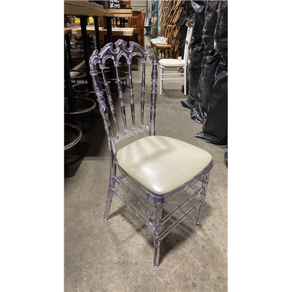 STACK OF 8 CLEAR PLASTIC COMMERCIAL STACKING EVENT CHAIRS WITH CUSHIONS