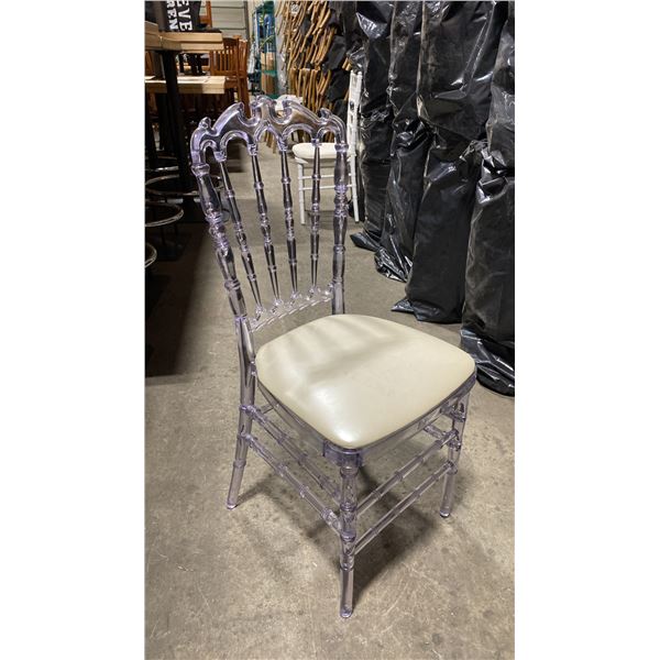STACK OF 8 CLEAR PLASTIC COMMERCIAL STACKING EVENT CHAIRS WITH CUSHIONS