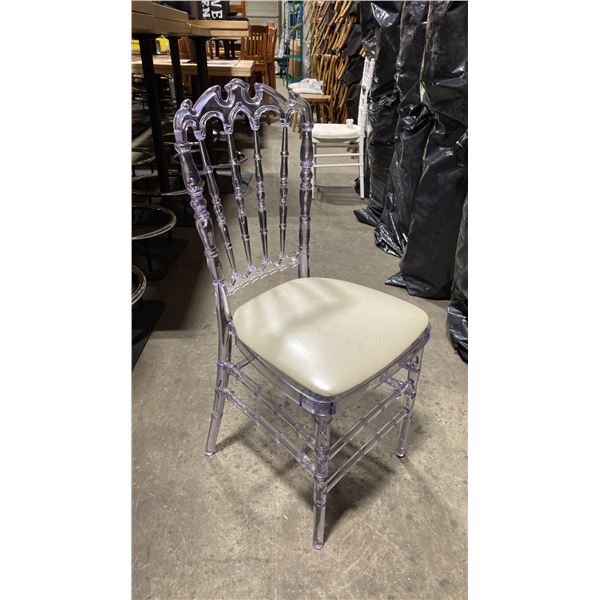 STACK OF 8 CLEAR PLASTIC COMMERCIAL STACKING EVENT CHAIRS WITH CUSHIONS