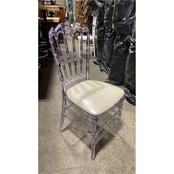 STACK OF 8 CLEAR PLASTIC COMMERCIAL STACKING EVENT CHAIRS WITH CUSHIONS