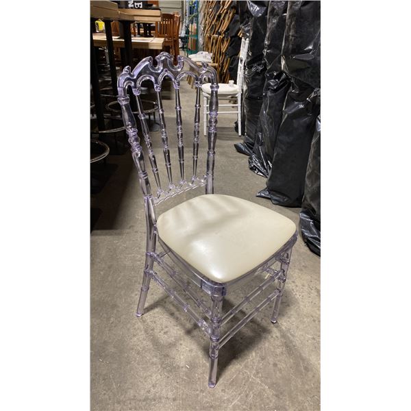 STACK OF 8 CLEAR PLASTIC COMMERCIAL STACKING EVENT CHAIRS WITH CUSHIONS