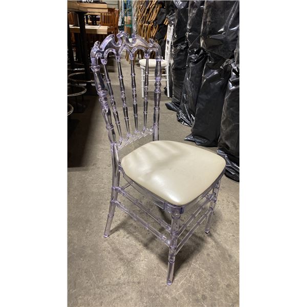 STACK OF 8 CLEAR PLASTIC COMMERCIAL STACKING EVENT CHAIRS WITH CUSHIONS