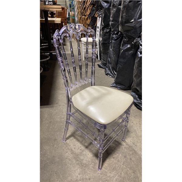 STACK OF 8 CLEAR PLASTIC COMMERCIAL STACKING EVENT CHAIRS WITH CUSHIONS