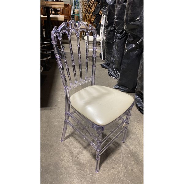 STACK OF 8 CLEAR PLASTIC COMMERCIAL STACKING EVENT CHAIRS WITH CUSHIONS