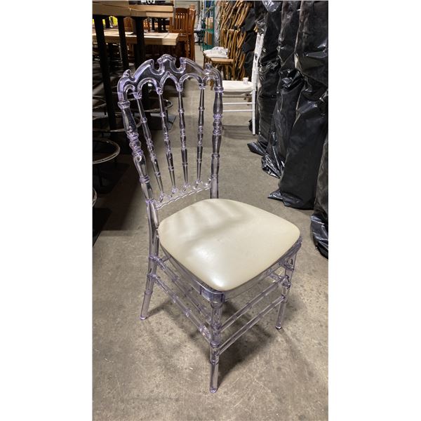 STACK OF 8 CLEAR PLASTIC COMMERCIAL STACKING EVENT CHAIRS WITH CUSHIONS