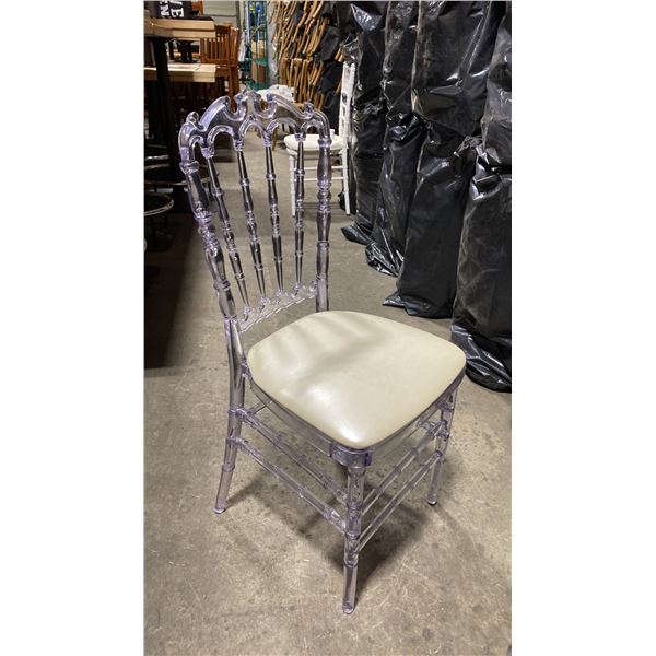STACK OF 8 CLEAR PLASTIC COMMERCIAL STACKING EVENT CHAIRS WITH CUSHIONS