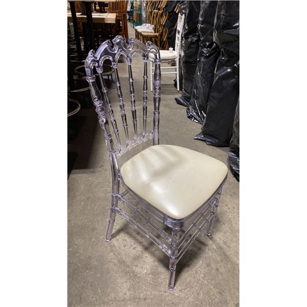 STACK OF 8 CLEAR PLASTIC COMMERCIAL STACKING EVENT CHAIRS WITH CUSHIONS