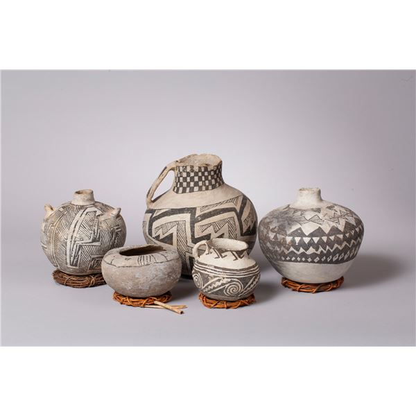 Five Assorted Anasazi Pots including a Pitcher, Seed Jar, and Canteen