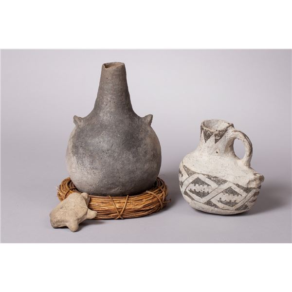 An Interesting Prehistoric Group of Anasazi Objects Including a Red Mesa Canteen, Duck Pitcher, and 