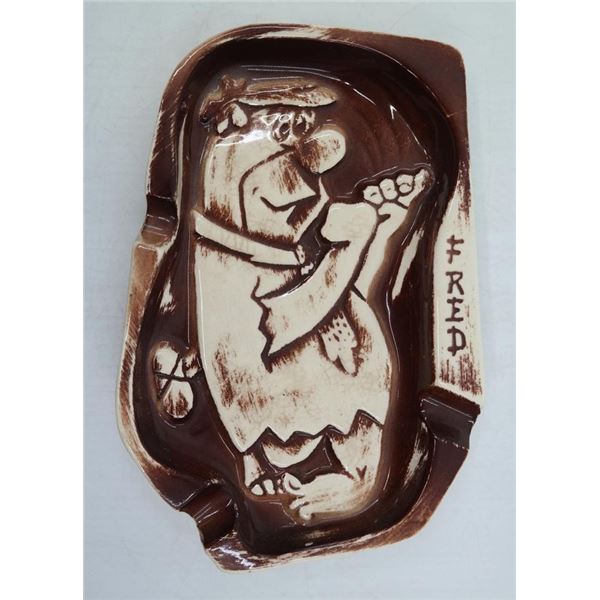 A Fred Flintstone Ashtray.