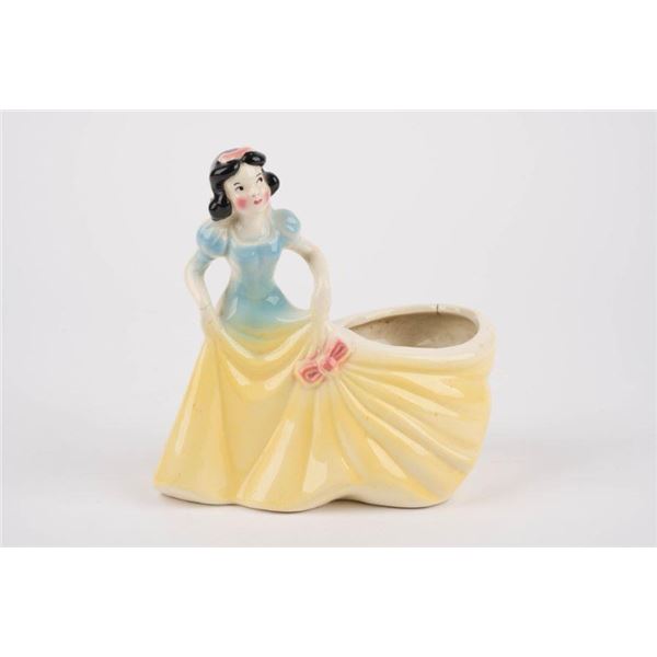 A 1940s Snow White Ceramic Planter.