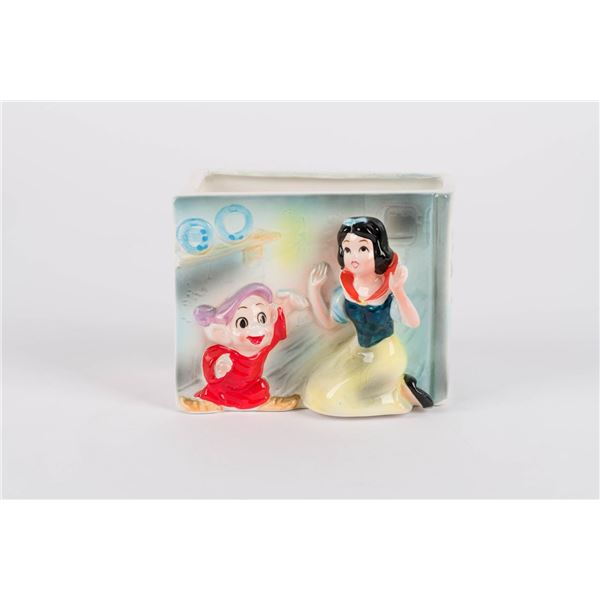 A Snow White and Dopey Ceramic Planter by Enesco.