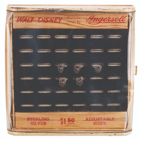 A Walt Disney Ingersoll Ring Display with Five Rings.