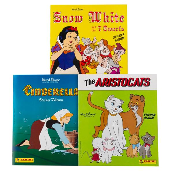 Three Walt Disney Pictures Sticker Albums.