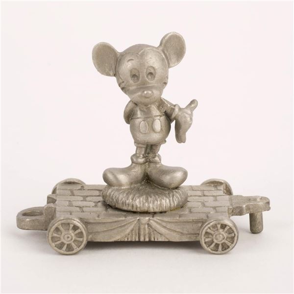 A Disney Treasures Mickey Mouse Pewter Miniature Train Figure.