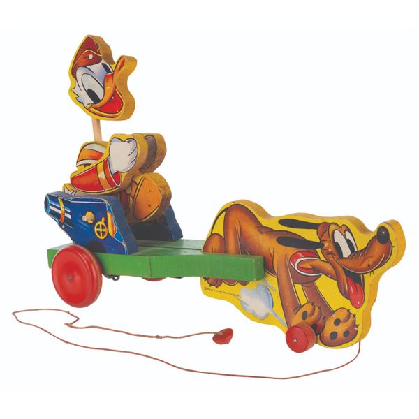 A Fisher Price 744 Doughboy Donald Pull Toy.