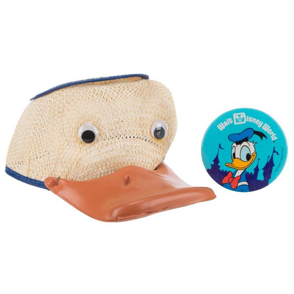 A Donald Duck Squeaker Hat and Button.