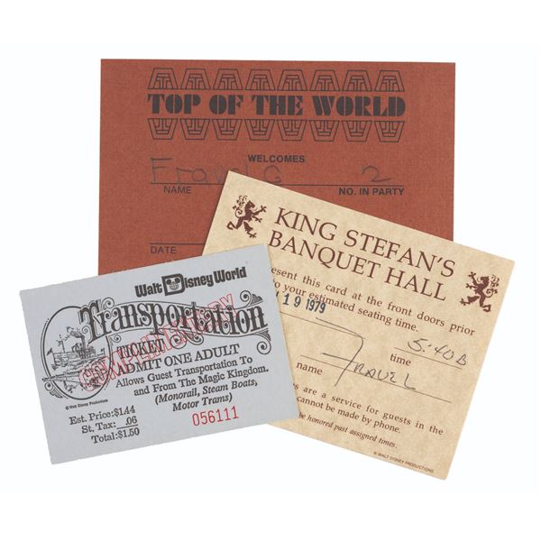 A Pair of Restaurant Reservation Cards and Transportation Ticket.