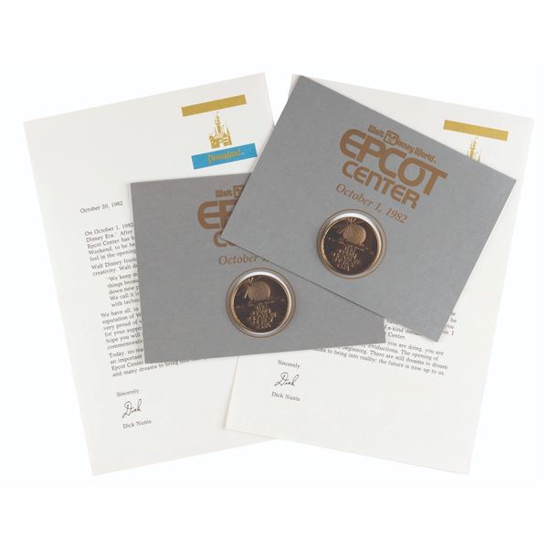 A Pair of EPCOT Opening Day Commemorative Coins.