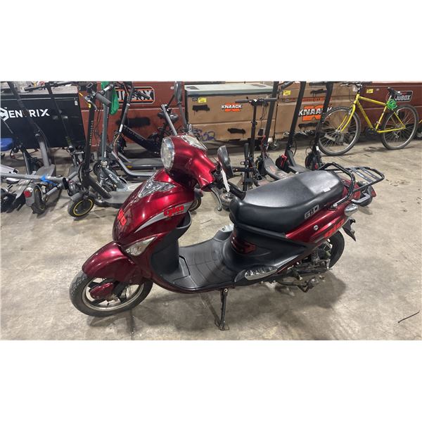 GIO RED ELECTRIC RIDE ON SCOOTER *NO KEYS, HAS BATTERY & CHARGER, FLAT TIRES*
