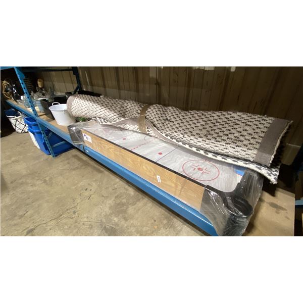 SHELF OF ASSORTED STORAGE BASKETS, FAUX PLANT DECOR, AIR HOCKEY TABLE & BRAIDED STYLE DESIGNER RUG