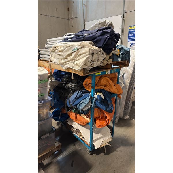 RACK OF MISC TARPS AND FOLDING AWNINGS