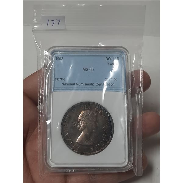 1962 Graded MS-65 Silver Dollar.